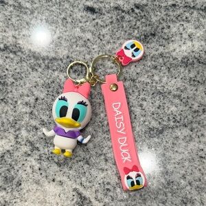 Disney Daisy Duck Keychain with Pink and Purple Accents